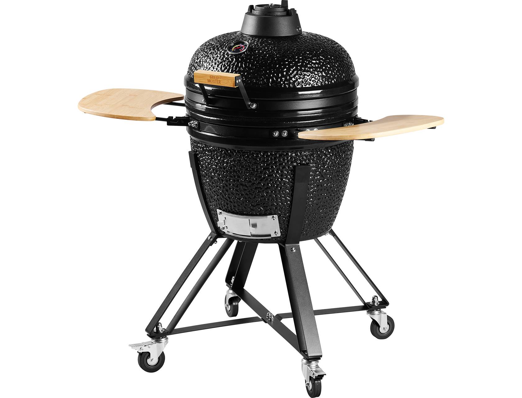 Fekete kerámia kamado grill fa oldalsó asztalokkal és görgős állvánnyal.