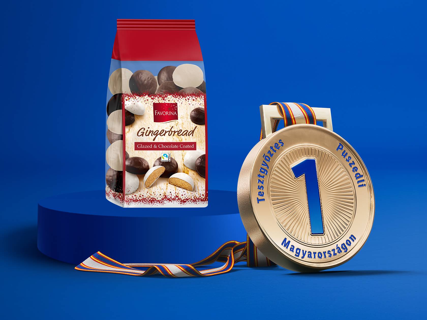 Favorina mézeskalács és egy aranyérem a 'Tesztgyőztes Puszédli Hungarianországon' felirattal.